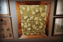 I like to put fabric behind picture frames, then use the glass as a "white" board.